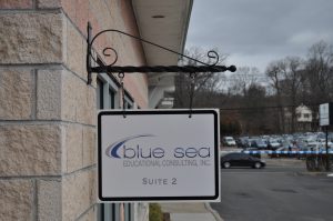 Fort Lauderdale Wayfinding Signs outdoor hanging blade sign blue sea building business wayfinding address sign 300x199